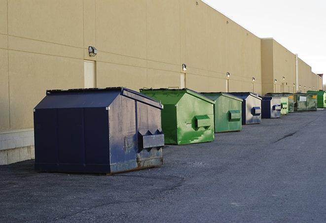 metal waste containers sit at a busy construction site in Copley OH